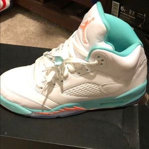 Jordan’s teal, white, orange